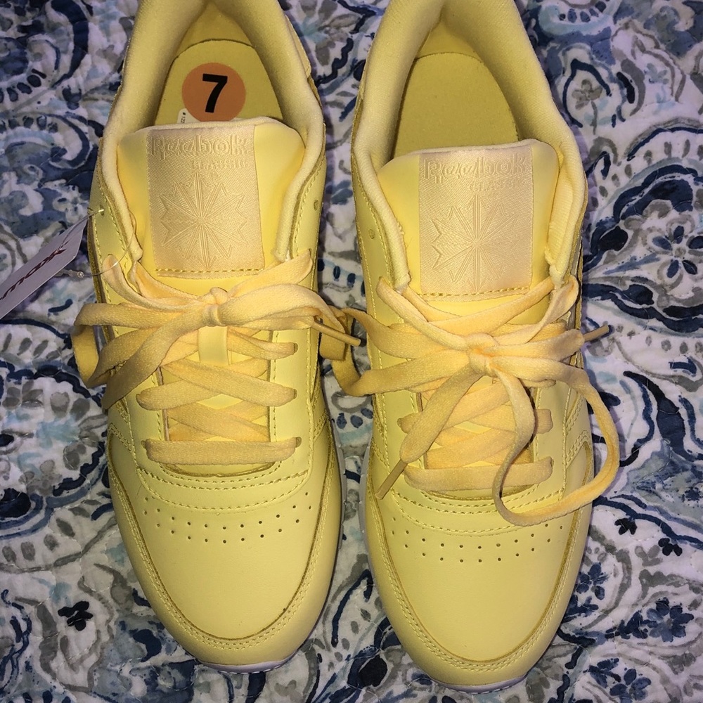 Pastel yellow Reeboks NTW
